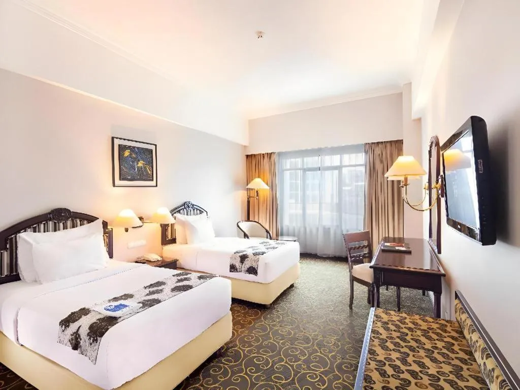 Bed in Blue Sky Hotel