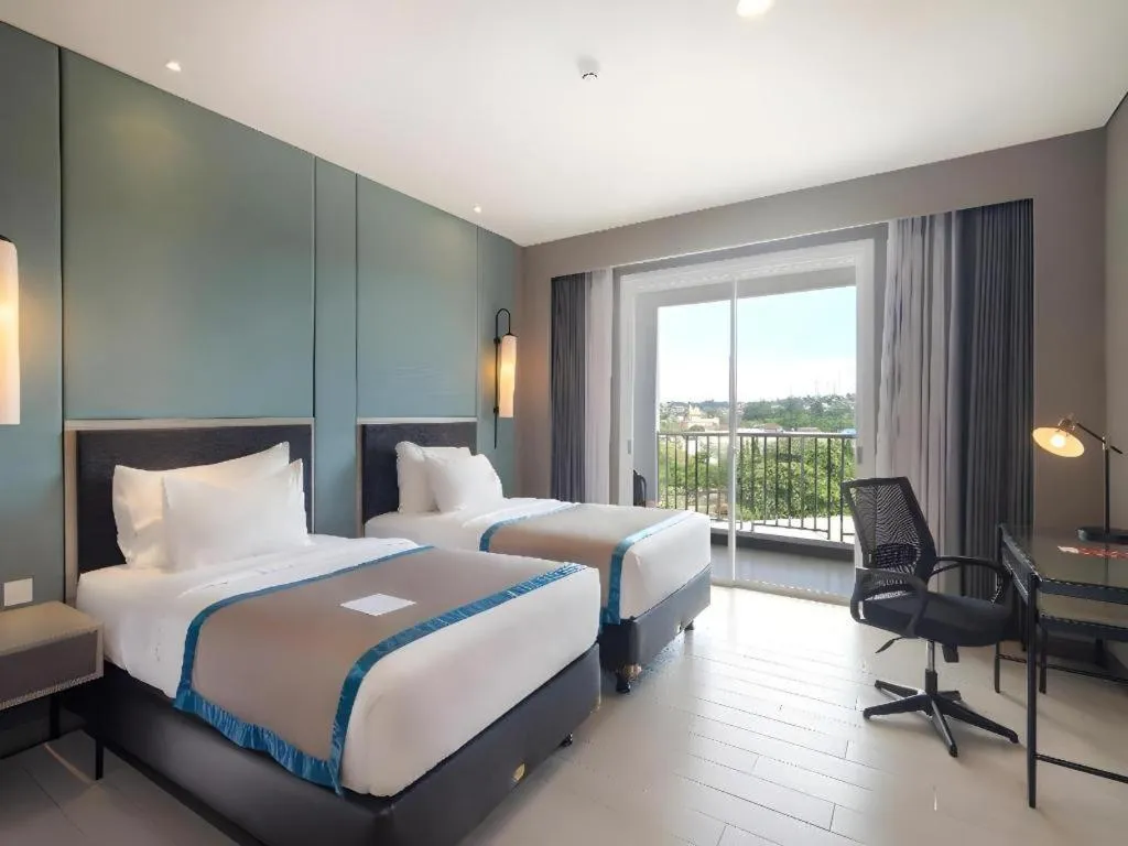 Bed in Blue Sky Hotel