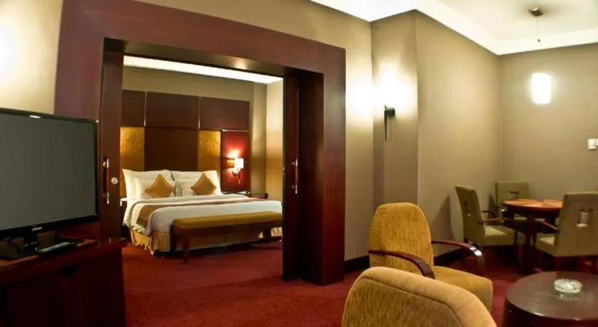 Bed in Blue Sky Hotel