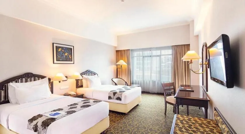 Bed in Blue Sky Hotel