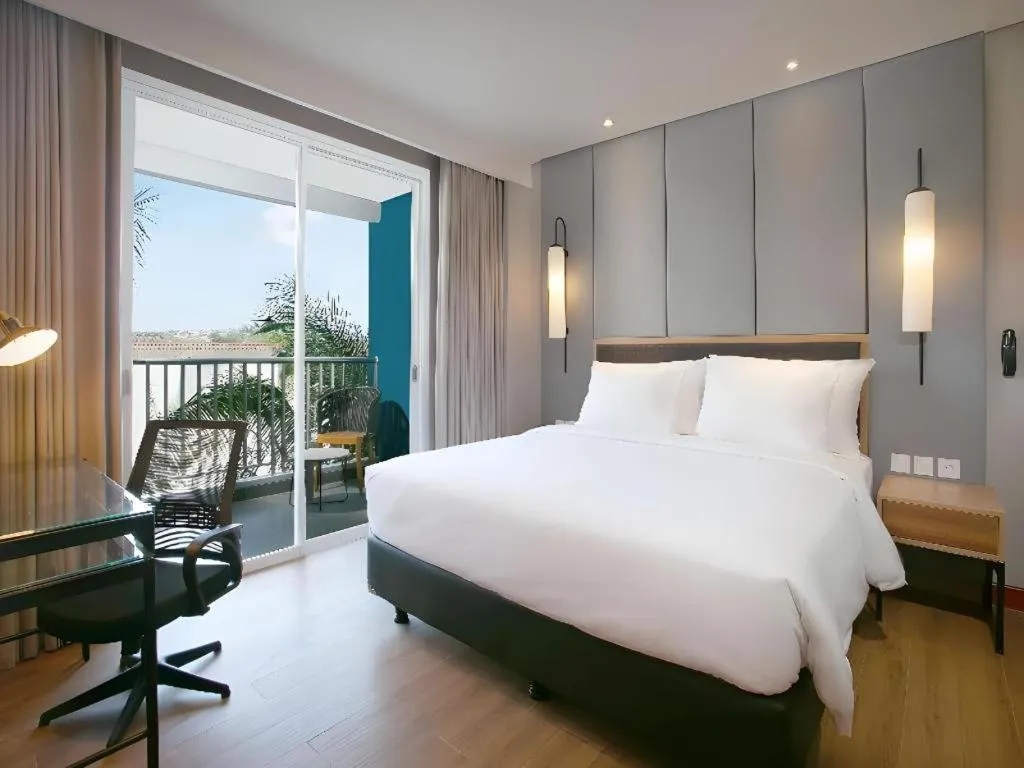 Bed in Blue Sky Hotel