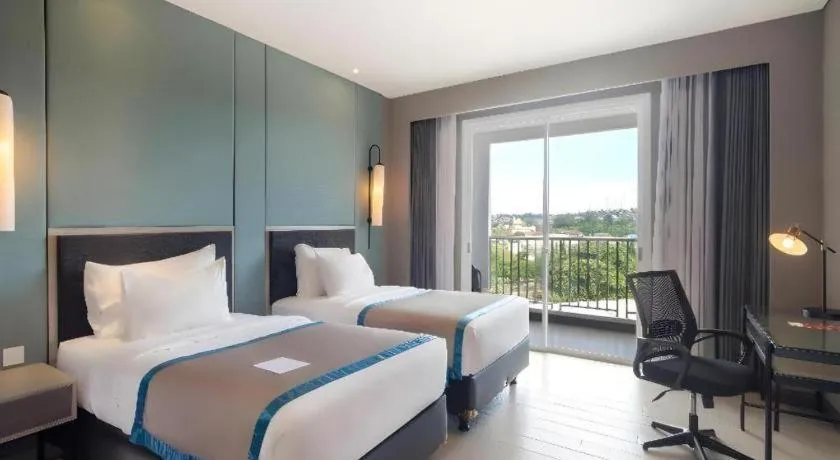 Bed in Blue Sky Hotel