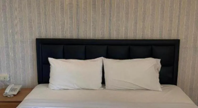 Bed in SR Hotel