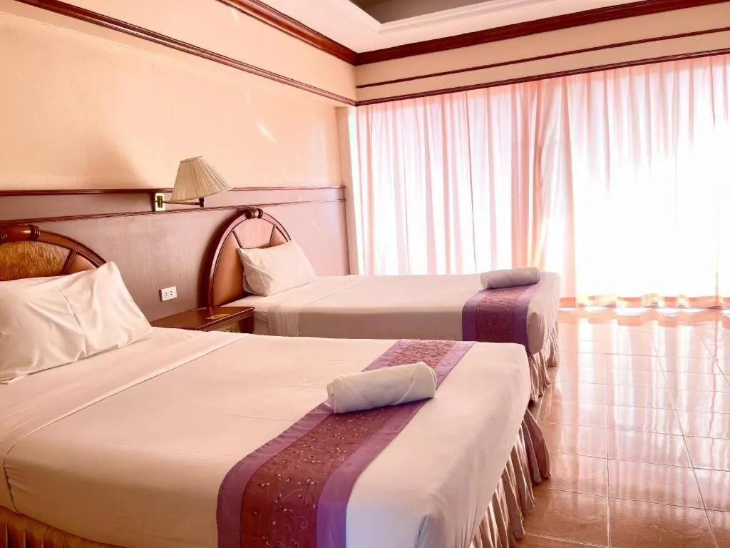 Bed in Supar Royal Beach Hotel