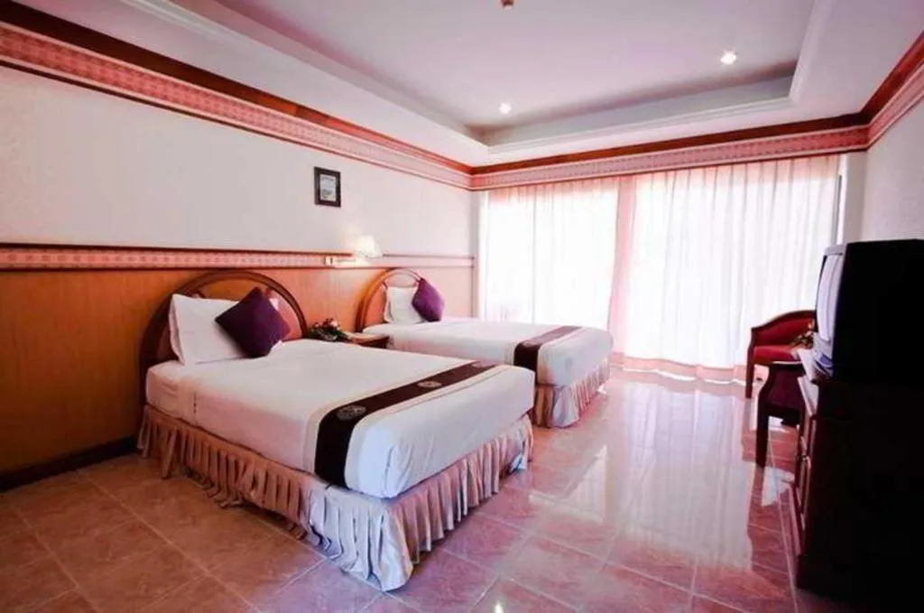 Bed in Supar Royal Beach Hotel
