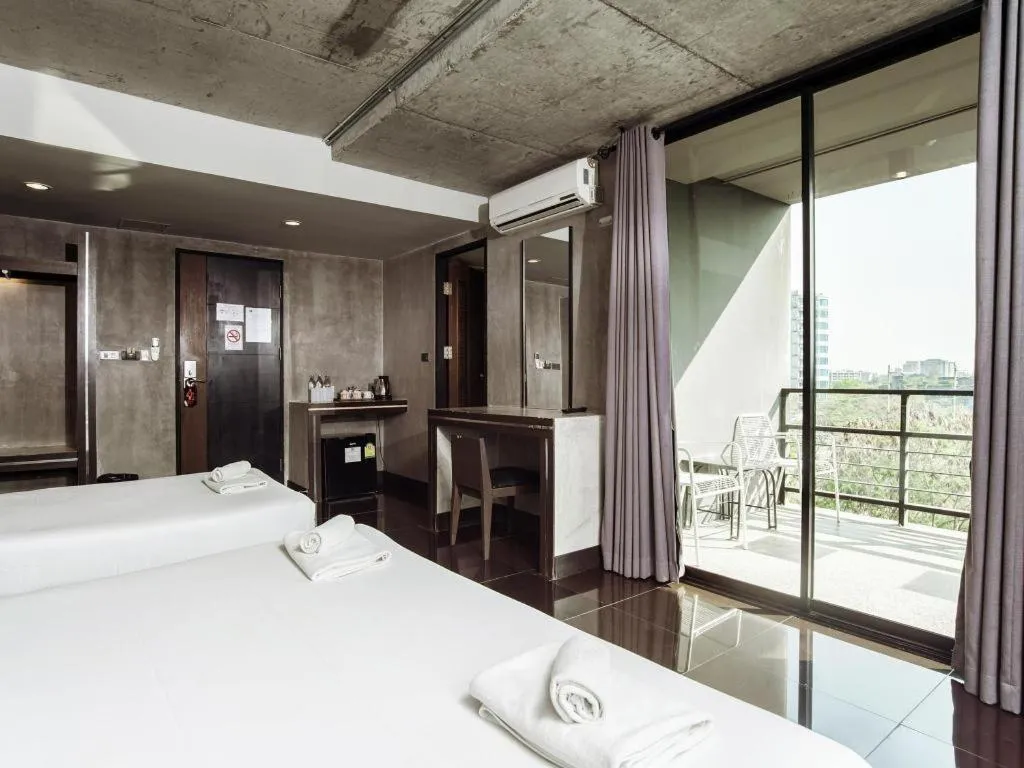 Bed in B2 Black Business and Budget Hotel