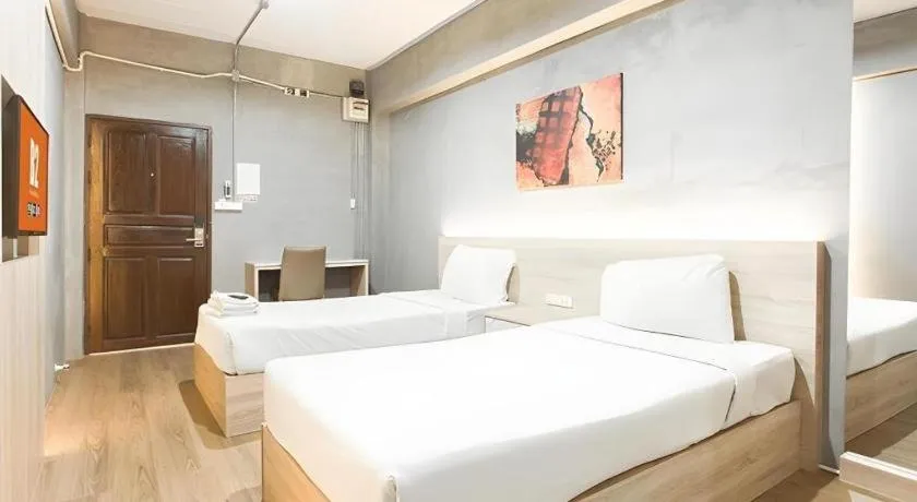 Bed in B2 Santitham Boutique & Budget Hotel