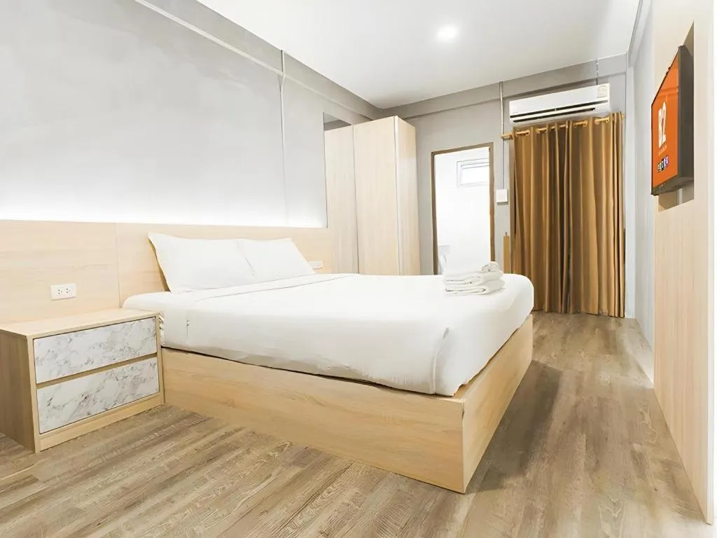 Bed in B2 Santitham Boutique & Budget Hotel