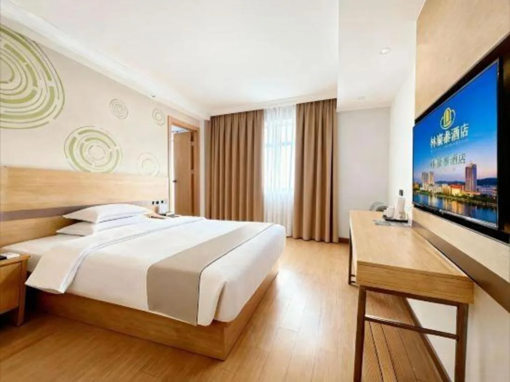 Bed in GreenTree Inn Suites HongQiao Airport Branch