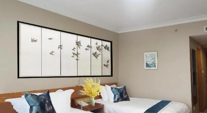 Bed in GreenTree Inn Suites HongQiao Airport Branch