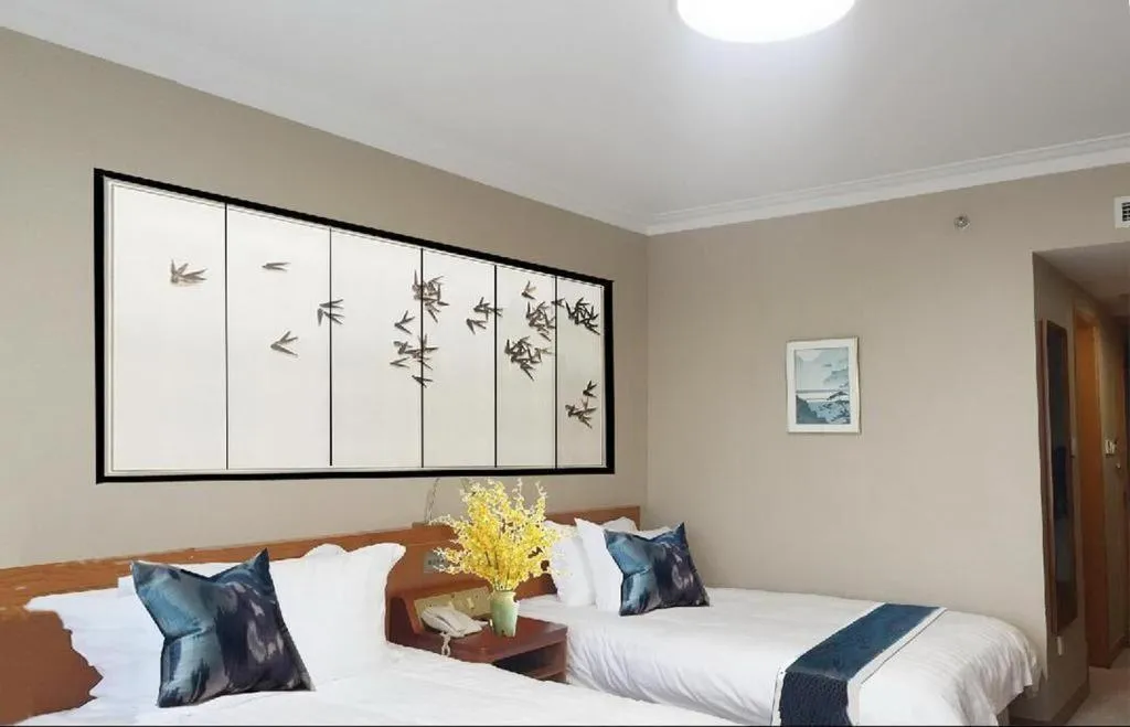 Bed in GreenTree Inn Suites HongQiao Airport Branch