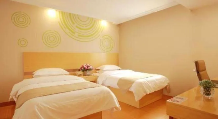 Bed in GreenTree Inn Suites HongQiao Airport Branch
