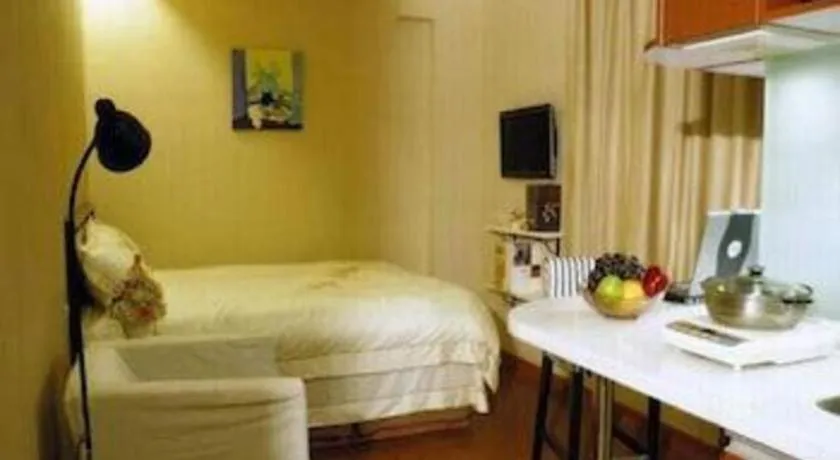 Bed in GreenTree Inn Suites HongQiao Airport Branch