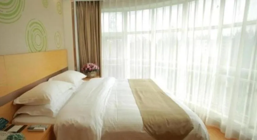 Bed in GreenTree Inn Suites HongQiao Airport Branch