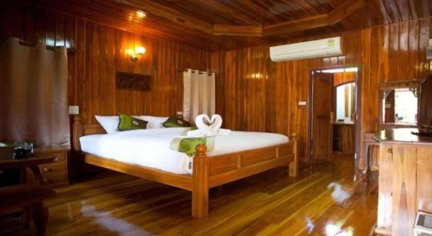Bed in Srisawat Resort