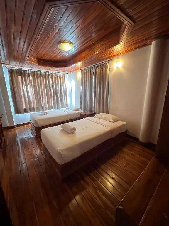 Bed in Srisawat Resort