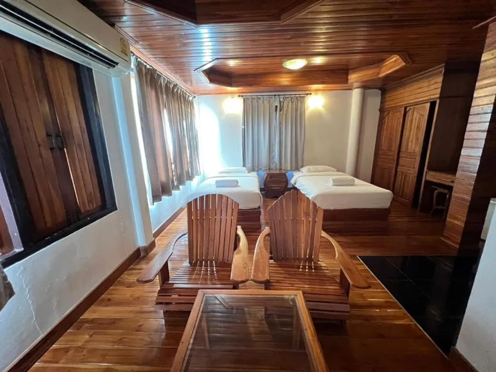 Bed in Srisawat Resort