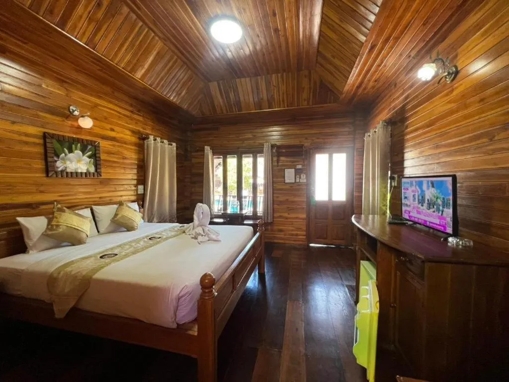 Bed in Srisawat Resort