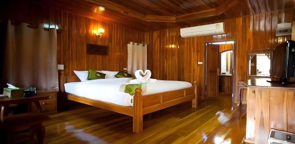 Bed in Srisawat Resort