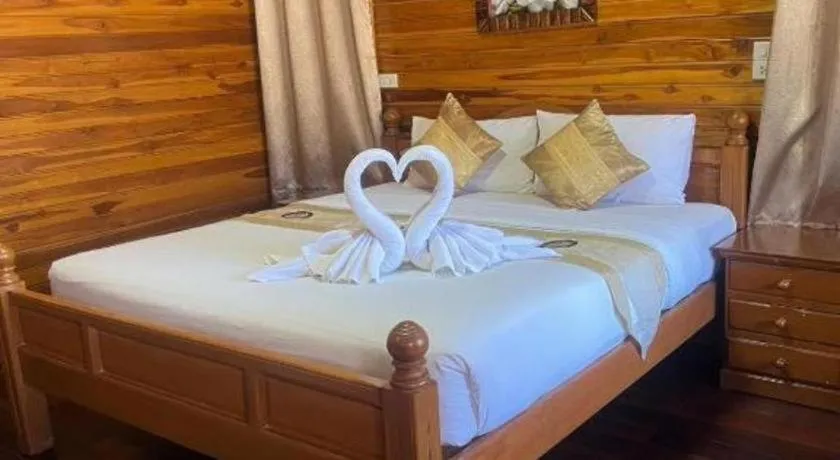 Bed in Srisawat Resort