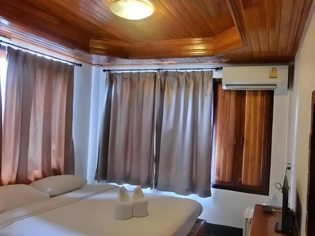 Bed in Srisawat Resort