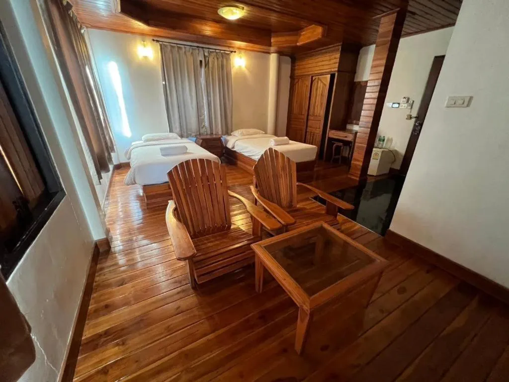 Bed in Srisawat Resort