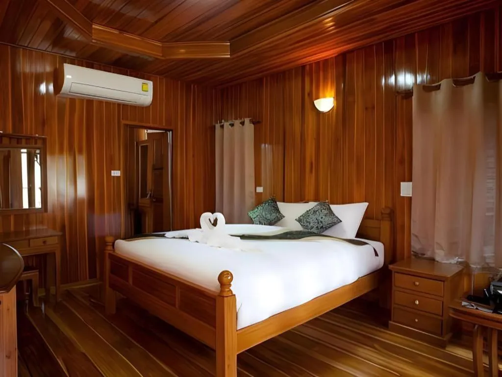 Bed in Srisawat Resort