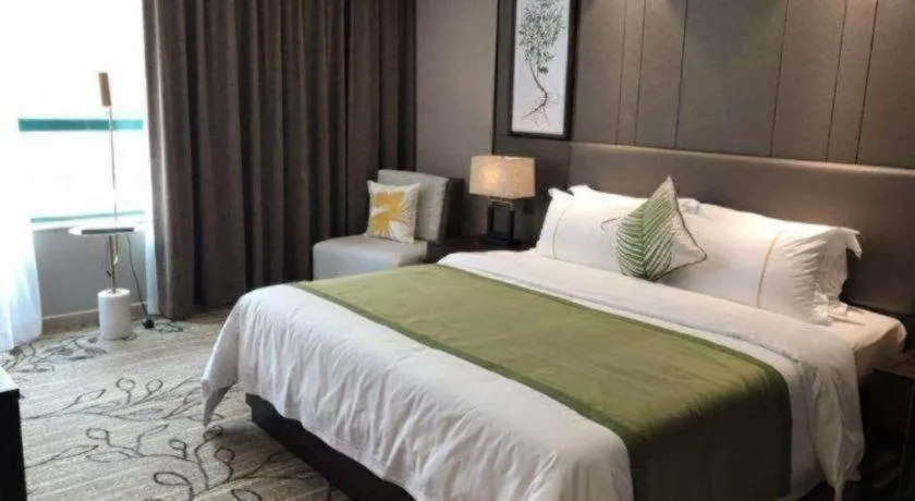 Bed in New Pearl River Hotel