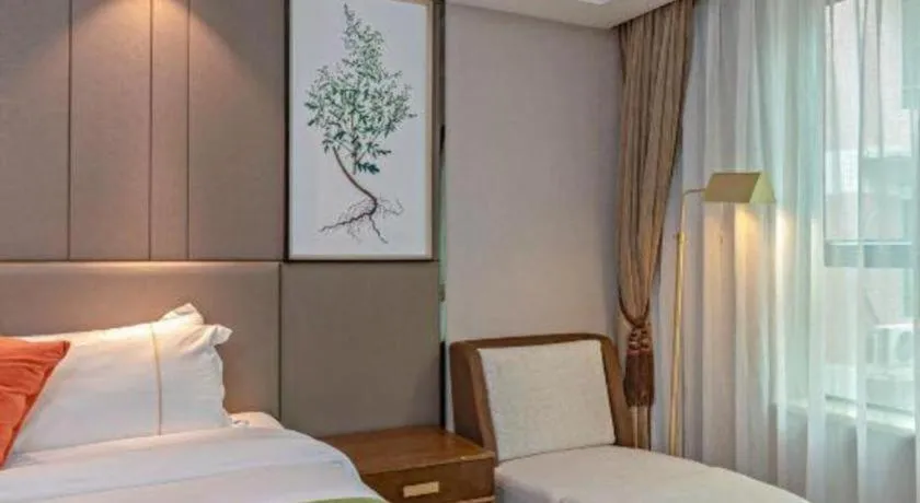 Bed in New Pearl River Hotel