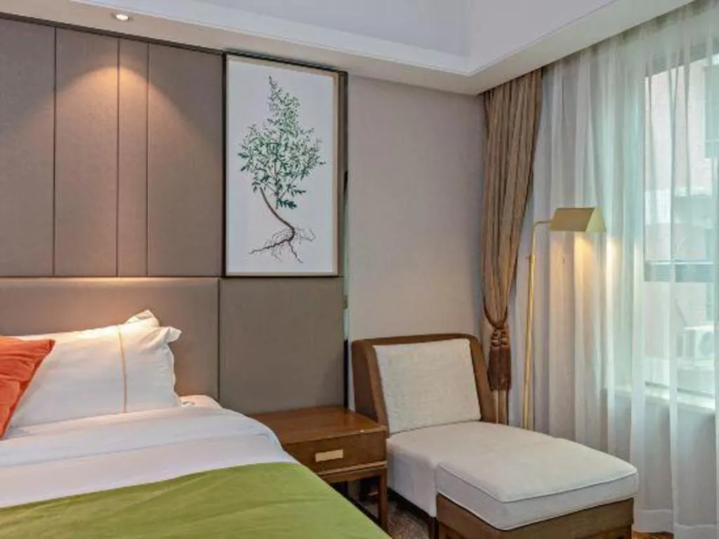 Bed in New Pearl River Hotel