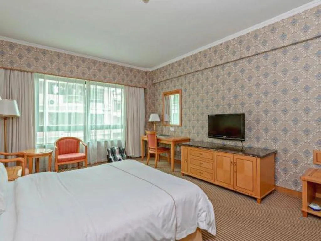 Bed in New Pearl River Hotel