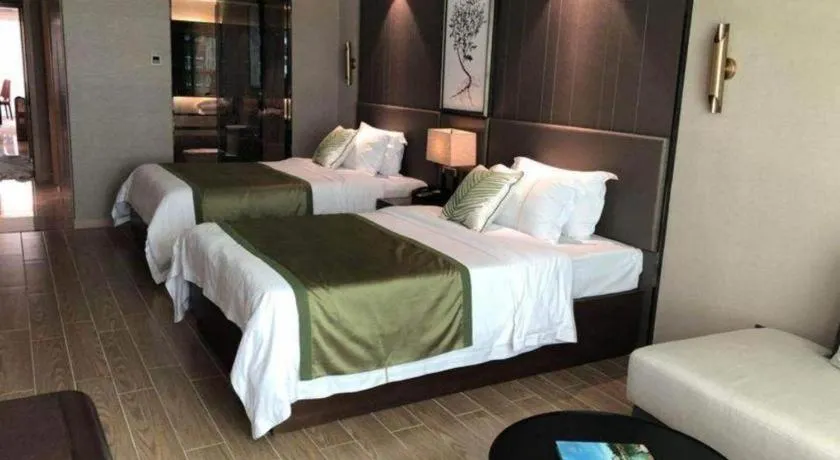 Bed in New Pearl River Hotel