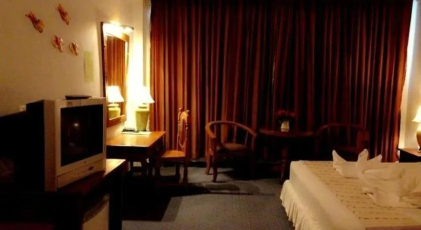 Bed in Thepnakorn Hotel