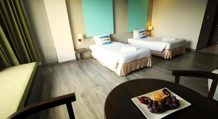 Bed in Thepnakorn Hotel