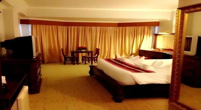 Bed in Thepnakorn Hotel
