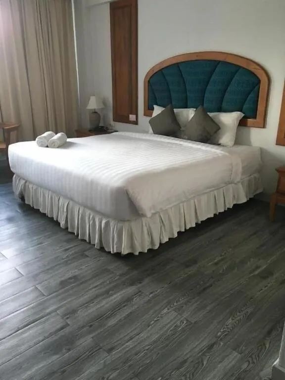 Bed in Thepnakorn Hotel