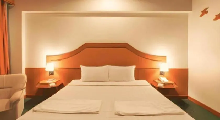 Bed in Thepnakorn Hotel