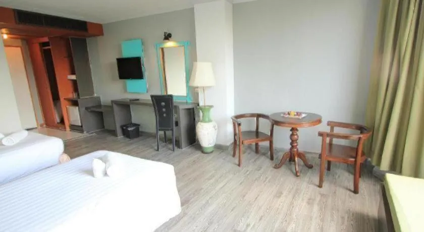 Bed in Thepnakorn Hotel