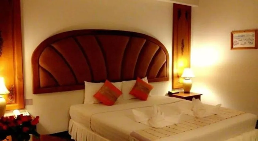 Bed in Thepnakorn Hotel