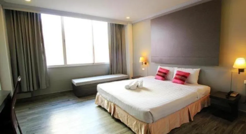 Bed in Thepnakorn Hotel