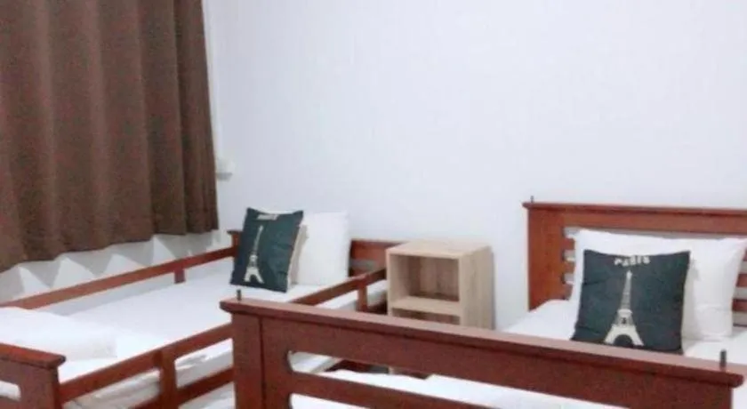 Bed in Thepnakorn Hotel