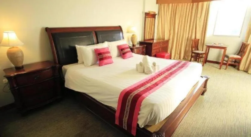 Bed in Thepnakorn Hotel