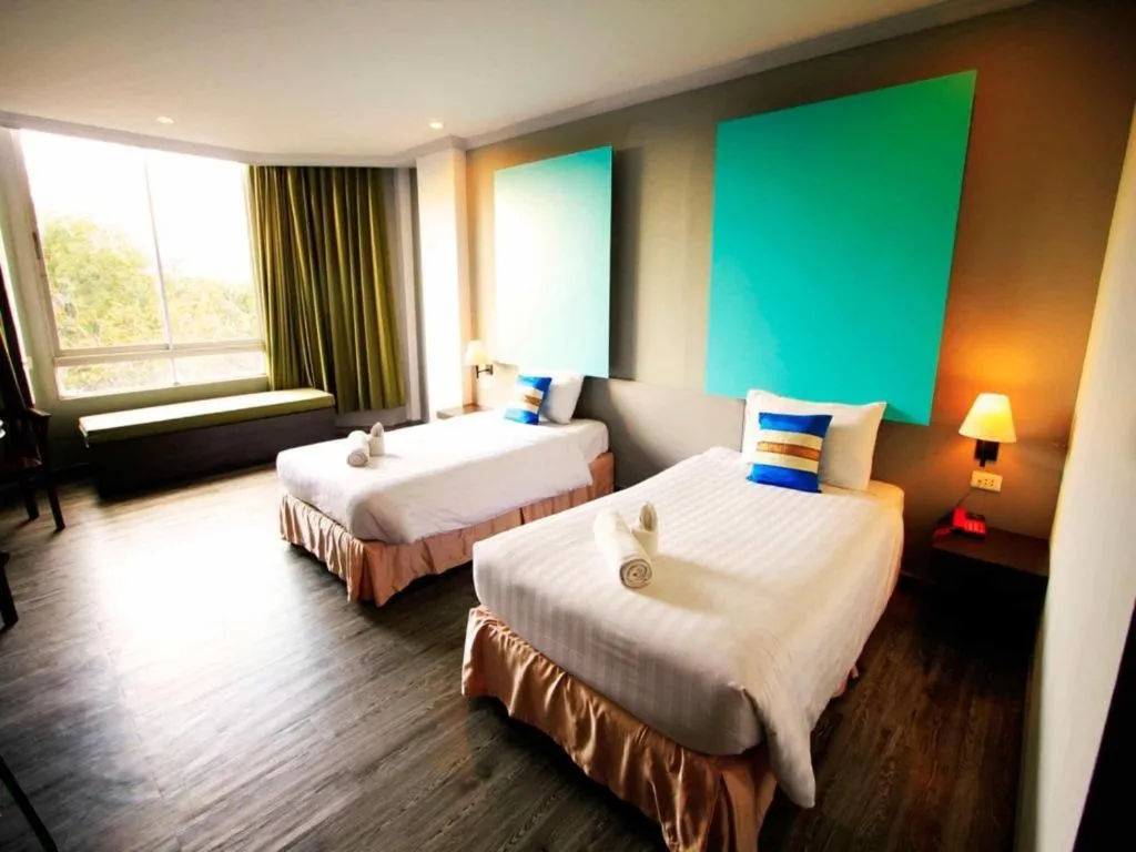 Bed in Thepnakorn Hotel