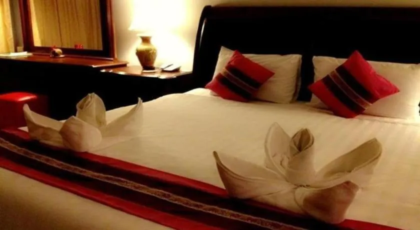 Bed in Thepnakorn Hotel