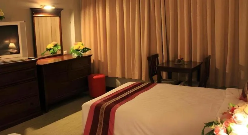 Bed in Thepnakorn Hotel