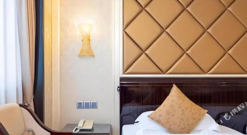 Bed in Sun City Hotel Haikou