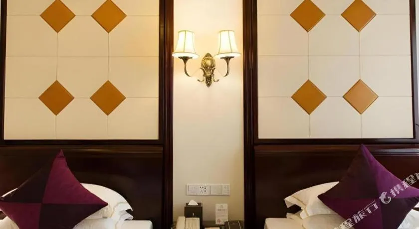 Bed in Sun City Hotel Haikou