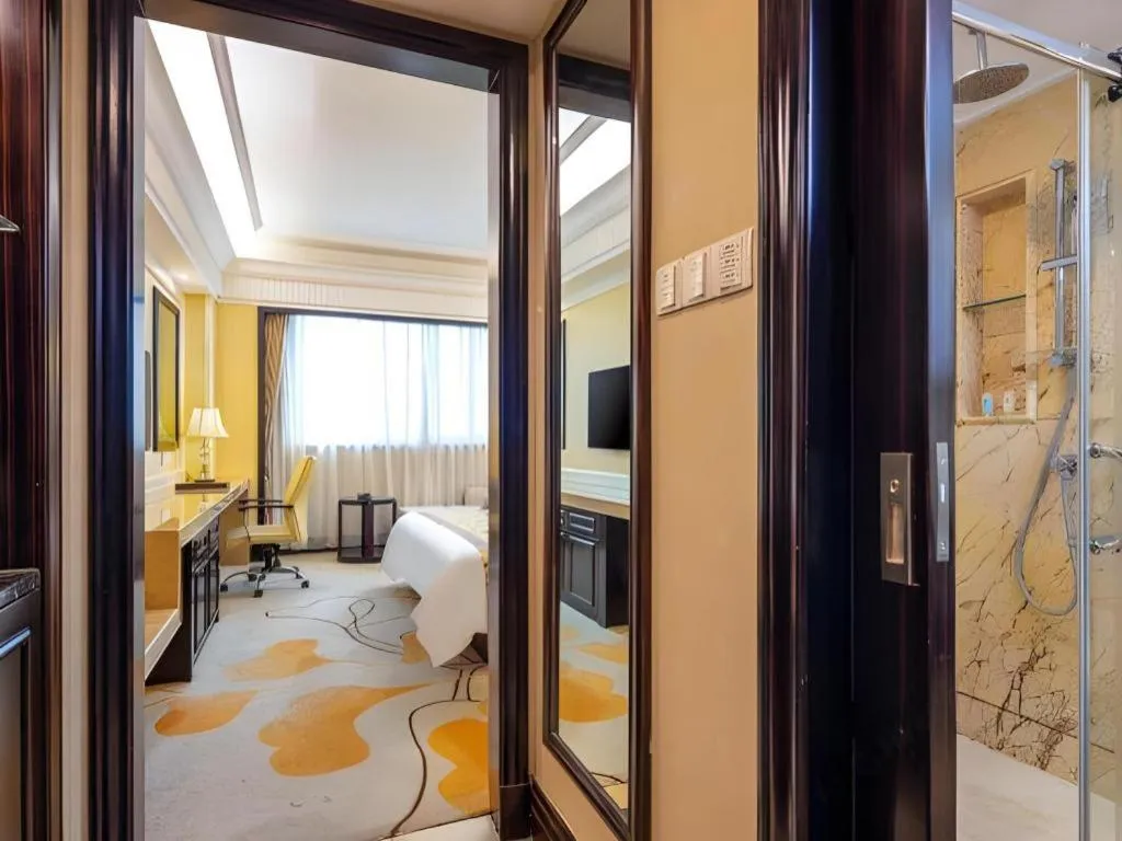 Bed in Sun City Hotel Haikou