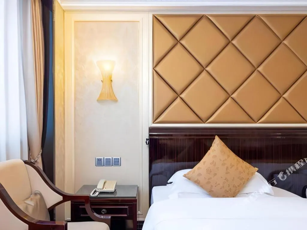 Bed in Sun City Hotel Haikou