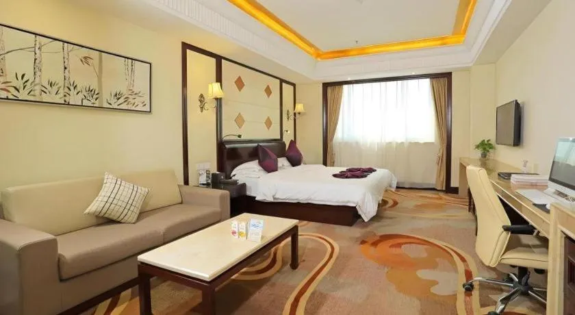 Bed in Sun City Hotel Haikou